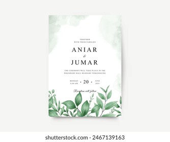 Wedding invitation card with green watercolor leaves