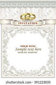 Wedding invitation card with rings in a frame with an ornament