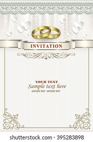 Wedding invitation card with rings in a frame with an ornament