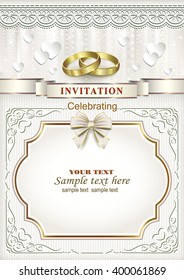 Wedding invitation card with rings in a frame with an ornament