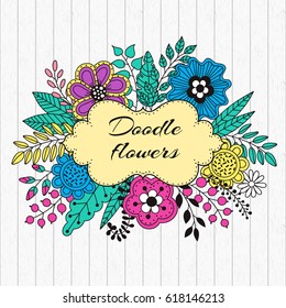 Wedding invitation card template. Frame of flower doodle. Card with flowers, berries and leaves with text frame over white wooden background. Vector illustration.
