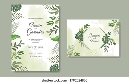 Wedding invitation card template set with tropical leaves decoration Premium Vector