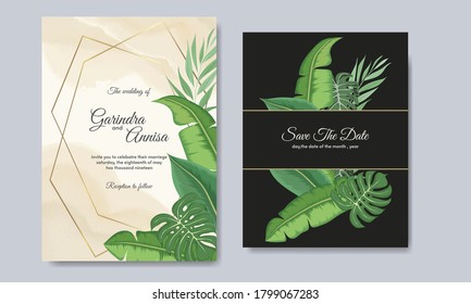 Wedding invitation card template set with tropical leaves decoration Premium Vector