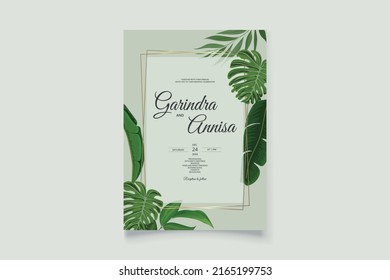 Wedding invitation card template set with beautiful  tropical leaves Premium Vector