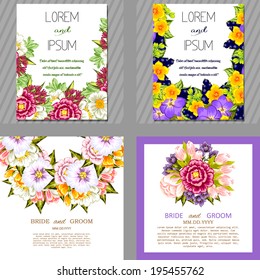 Wedding invitation cards with floral elements.