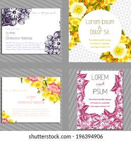 Wedding invitation cards with floral elements.