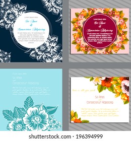 Wedding invitation cards with floral elements.