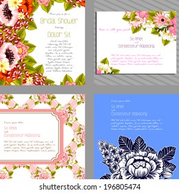 Wedding invitation cards with floral elements.