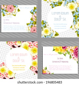 Wedding invitation cards with floral elements.