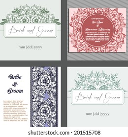 Wedding invitation cards with floral elements.