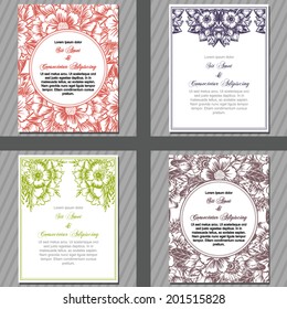 Wedding invitation cards with floral elements.