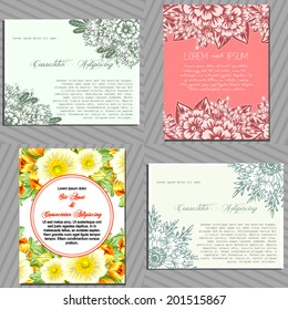 Wedding invitation cards with floral elements.