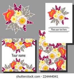 Wedding invitation cards with floral elements.