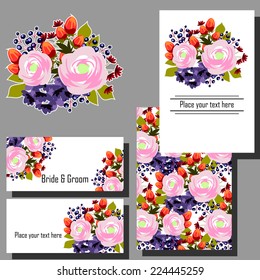 Wedding invitation cards with floral elements.