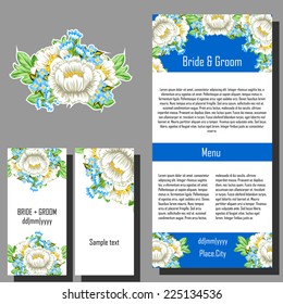 Wedding invitation cards with floral elements.