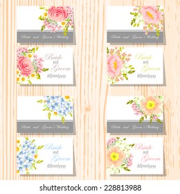 Wedding invitation cards with floral elements