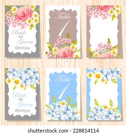 Wedding invitation cards with floral elements
