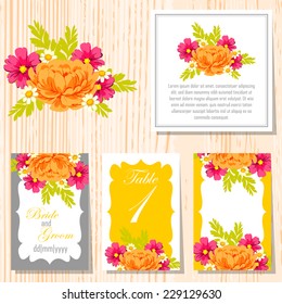 Wedding invitation cards with floral elements.