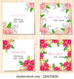 Wedding invitation cards with floral elements.