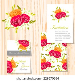 Wedding invitation cards with floral elements.