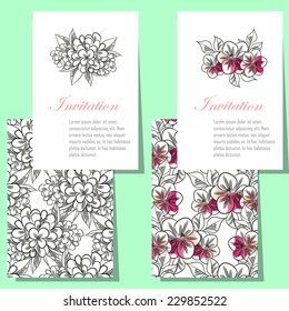 Wedding invitation cards with floral elements