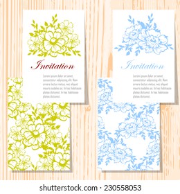 Wedding invitation cards with floral elements