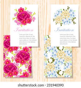 Wedding invitation cards with floral elements