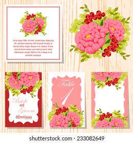 Wedding invitation cards with floral elements.