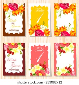 Wedding invitation cards with floral elements.