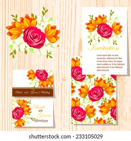 Wedding invitation cards with floral elements.