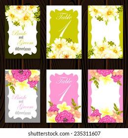 Wedding invitation cards with floral elements