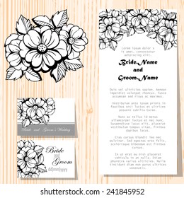 Wedding invitation cards with floral elements.