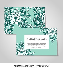 Wedding invitation cards with floral elements