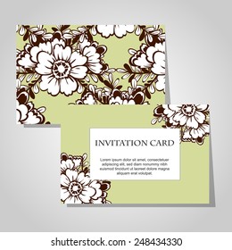 Wedding invitation cards with floral elements