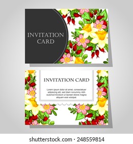 Wedding invitation cards with floral elements.