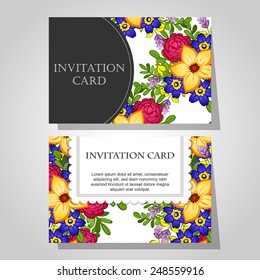 Wedding invitation cards with floral elements.