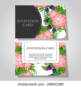 Wedding invitation cards with floral elements.