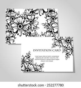 Wedding invitation cards with floral elements