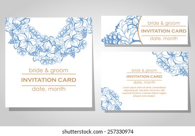 Wedding invitation cards with floral elements