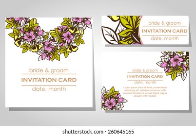 Wedding invitation cards with floral elements