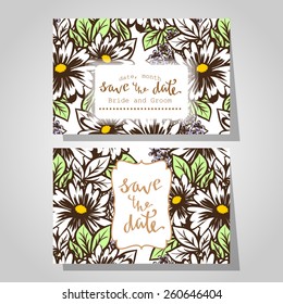 Wedding invitation cards with floral elements