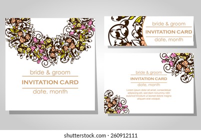 Wedding invitation cards with floral elements
