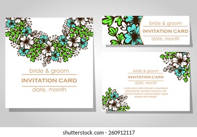 Wedding invitation cards with floral elements