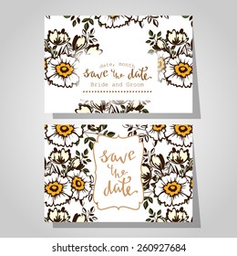 Wedding invitation cards with floral elements
