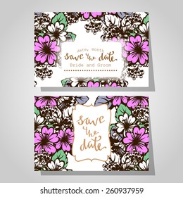Wedding invitation cards with floral elements