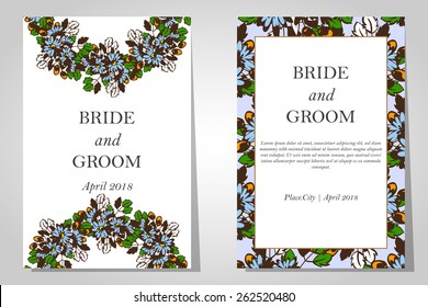Wedding invitation cards with floral elements.