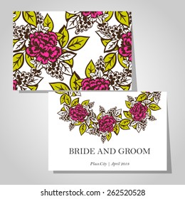Wedding invitation cards with floral elements.