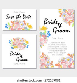 Wedding invitation cards with floral elements.
