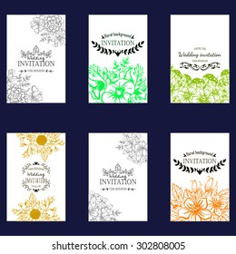 Wedding invitation cards with floral elements.