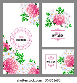 Wedding invitation cards with floral elements.